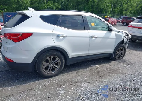 2014 Hyundai Santa Fe Sport 2.4L z USA, uszkodzony, nr VIN 5XYZUDLB7EG137485